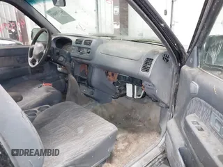 1998 Nissan Frontier with VIN 1N6DD26Y9WC341111, listed as a IAAI auction lot 42539460 with Not provided miles and . Bid and sale history available at DreamBid. Image 5.