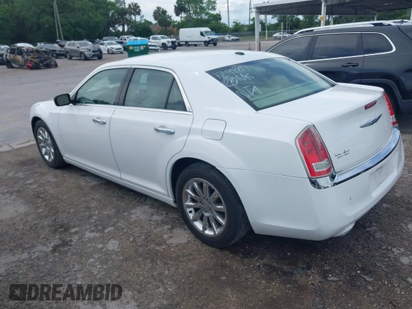 2012 Chrysler 300 Limited with VIN 2C3CCACG5CH129861, listed as a IAAI auction lot 41891121 with 146,141 mi miles. Bid and sale history available at carsss.com. Image 3.