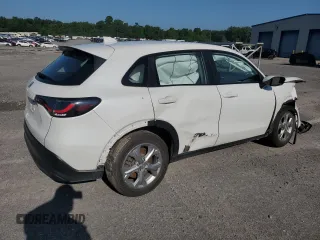 2023 Honda HR-V LX with VIN 3CZRZ2H38PM707744, listed as a Copart auction lot 60625805 with 82,874 mi miles and Salvage title. Bid and sale history available at DreamBid. Image 3.