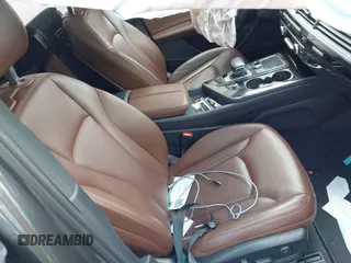 2018 Audi Q7 Prestige with VIN WA1VAAF75JD036199, listed as a IAAI auction lot 42557507 with 104,644 mi miles and . Bid and sale history available at DreamBid. Image 5.