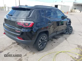 2020 Jeep Compass Trailhawk with VIN 3C4NJDDB7LT129673, listed as a IAAI auction lot 41811055 with 30,106 mi miles and . Bid and sale history available at carsss.com. Image 4.