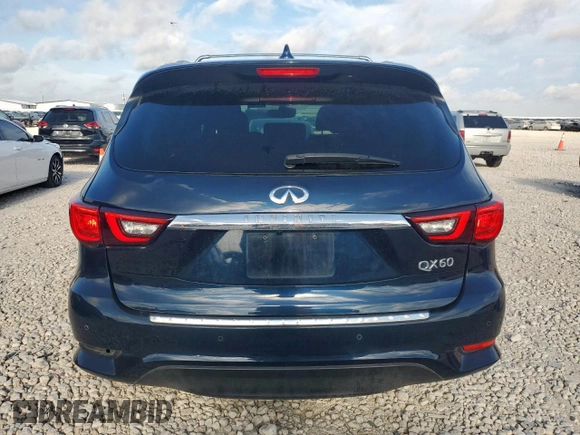 2020 Infiniti QX60 Luxe with VIN 5N1DL0MN2LC545517, listed as a Copart auction lot 65957365 with 93,656 mi miles and Salvage title. Bid and sale history available at DreamBid. Image 6.