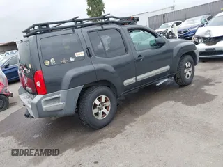 2012 Nissan Xterra S with VIN 5N1AN0NW4CC523071, listed as a IAAI auction lot 41874263 with 154,556 mi miles and . Bid and sale history available at DreamBid. Image 4.