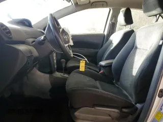 2012 Toyota Yaris z VIN JTDBT4K31CL027483, wystawiony jako Copart lot #59919165 z przebiegiem 81 298 mil mil oraz Szkoda całkowita • Salvage title. Historia ofert i sprzedaży dostępna na DreamBid. Obrazek 7.