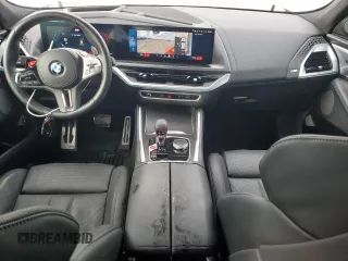 2024 BMW XM z VIN 5YM23CS0XR9V53110, wystawiony jako Copart lot #87039014 z przebiegiem 13 607 mil mil oraz Tytuł czysty. Historia ofert i sprzedaży dostępna na DreamBid. Obrazek 8.