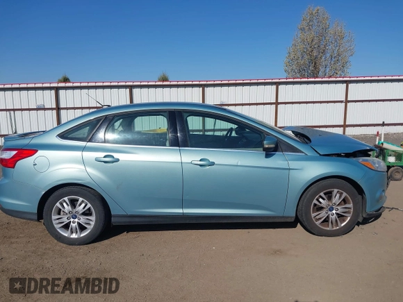 2012 Ford Focus SEL with VIN 1FAHP3H23CL417403, listed as a IAAI auction lot 42043152 with 140,604 mi miles. Bid and sale history available at carsss.com. Image 13.