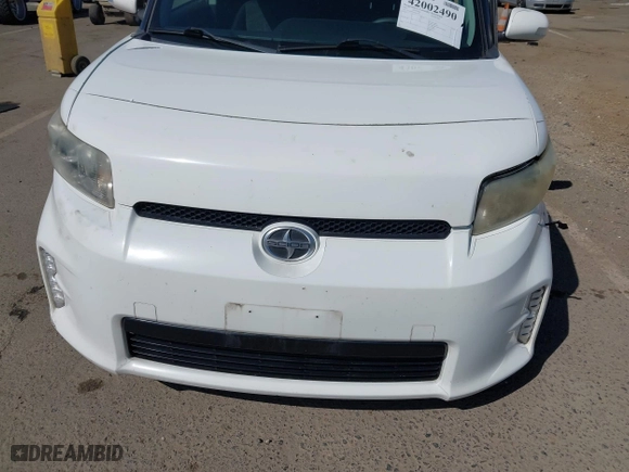 2013 Scion xB with VIN JTLZE4FEXDJ037953, listed as a IAAI auction lot 42002490 with 106,206 mi miles. Bid and sale history available at carsss.com. Image 12.