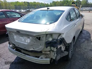 2017 Ford Fusion Titanium with VIN 3FA6P0K90HR266556, listed as a IAAI auction lot 41947924 with 135,628 mi miles. Bid and sale history available at carsss.com. Image 6.