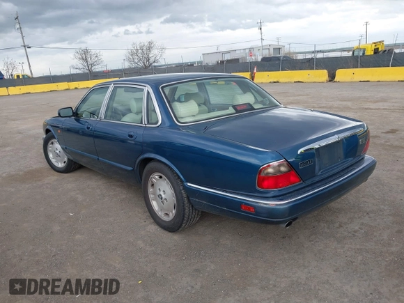 1996 Jaguar XJ with VIN SAJHX1743TC759842, listed as a IAAI auction lot 41778155 with 189,315 mi miles and . Bid and sale history available at DreamBid. Image 3.