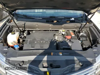 2018 Lincoln MKX Premiere z VIN 2LMPJ8JR7JBL38566, wystawiony jako Copart lot #70669944 z przebiegiem 69 860 mil mil oraz Szkoda całkowita • Salvage title. Historia ofert i sprzedaży dostępna na DreamBid. Obrazek 12.