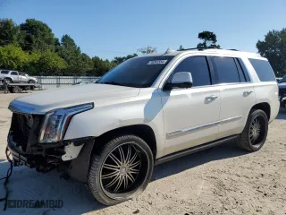 2015 Cadillac Escalade Platinum with VIN 1GYS4PKJ0FR588587, listed as a Copart auction lot 70265554 with 167,615 mi miles and Salvage Title. Bid and sale history available at carsss.com. Image 1.