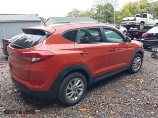 2016 Hyundai Tucson SE with VIN KM8J33A49GU118366, listed as a IAAI auction lot 40450987 with 89,118 mi miles. Bid and sale history available at carsss.com. Image 4.