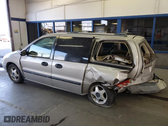 2003 Ford Windstar LX z VIN 2FMZA51423BA33048, wystawiony jako Copart lot #73987964 z przebiegiem 121 411 mil mil oraz Szkoda całkowita • Salvage title. Historia ofert i sprzedaży dostępna na DreamBid. Obrazek 2.