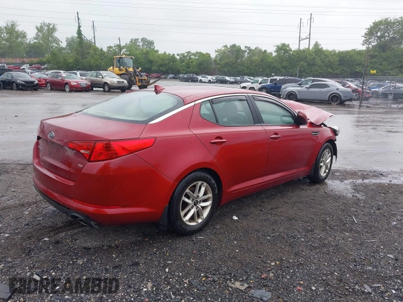2011 Kia Optima LX z VIN KNAGM4A75B5168564, wystawiony jako IAAI lot #42301373 z przebiegiem Nie podano mil oraz . Historia ofert i sprzedaży dostępna na DreamBid. Obrazek 4.