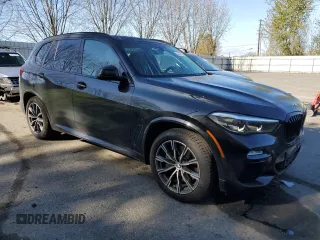 2021 BMW X5 xDrive45e with VIN 5UXTA6C0XM9E92063, listed as a Copart auction lot 54070165 with 14,725 mi miles and Salvage Title. Bid and sale history available at DreamBid. Image 4.