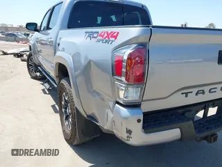 2021 Toyota Tacoma SR with VIN 3TMCZ5AN6MM393306, listed as a IAAI auction lot 42094095 with 57,217 mi miles and . Bid and sale history available at DreamBid. Image 17.