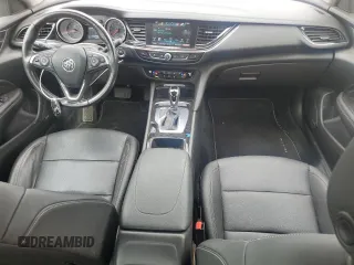 2018 Buick Regal Essence с VIN W04GP6SX8J1086932, выставлен на аукционе Copart как лот 54824185 с пробегом 69 473 миль миль и Списание • Salvage title. История ставок и продаж доступна на DreamBid. Изображение 8.