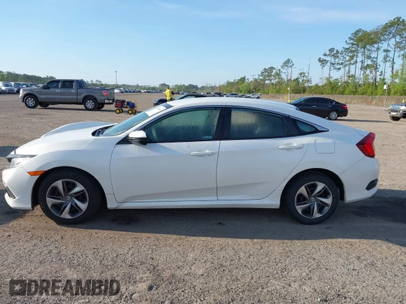2020 Honda Civic LX with VIN 19XFC2F62LE212421, listed as a IAAI auction lot 41909995 with 46,312 mi miles and . Bid and sale history available at DreamBid. Image 14.