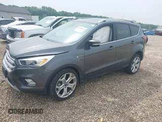2019 Ford Escape Titanium with VIN 1FMCU0J97KUA34281, listed as a IAAI auction lot 42409579 with 55,400 mi miles and . Bid and sale history available at DreamBid. Image 2.