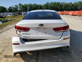 2020 Kia Optima LX z VIN 5XXGT4L32LG425080, wystawiony jako Copart lot #55142055 z przebiegiem 79 485 mil mil oraz Nie do naprawy • Non repairable. Historia ofert i sprzedaży dostępna na DreamBid. Obrazek 6.