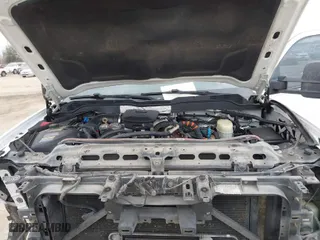 2015 Chevrolet Silverado 2500HD LTZ with VIN 1GC1KWE89FF149299, listed as a IAAI auction lot 41565330 with 249,551 mi miles. Bid and sale history available at carsss.com. Image 10.