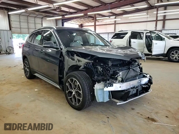 2021 BMW X1 xDrive28i with VIN WBXJG9C00M5S35249, listed as a Copart auction lot 61895775 with 34,641 mi miles and Salvage title. Bid and sale history available at DreamBid. Image 14.
