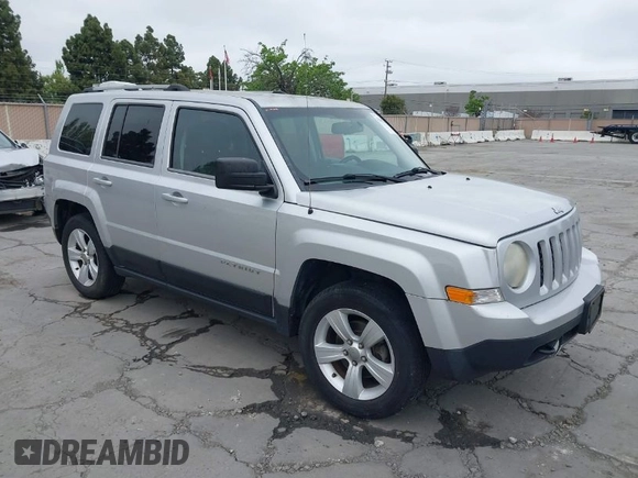 2014 Jeep Patriot Limited with VIN 1C4NJRCB0ED504715, listed as a IAAI auction lot 42080254 with 198,380 mi miles. Bid and sale history available at carsss.com. Image 1.