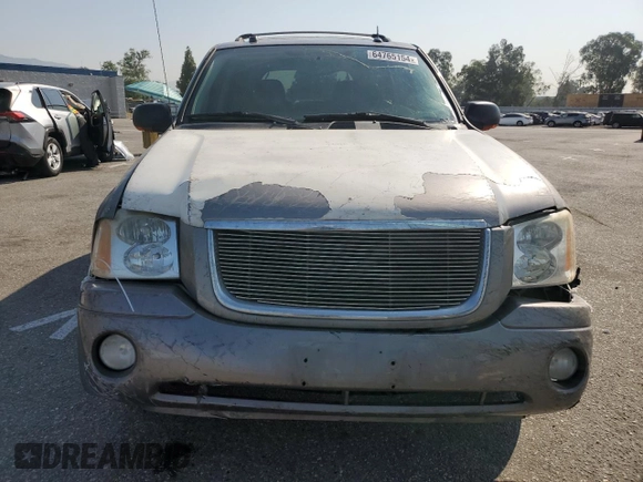 2005 GMC Envoy SLT with VIN 1GKDS13S952382088, listed as a Copart auction lot 64765154 with 177,333 mi miles and Salvage Title. Bid and sale history available at carsss.com. Image 5.