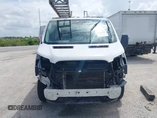 2015 Ford Transit Cargo with VIN 1FTNR1ZM9FKA50724, listed as a IAAI auction lot 42506872 with 155,117 mi miles and . Bid and sale history available at DreamBid. Image 6.