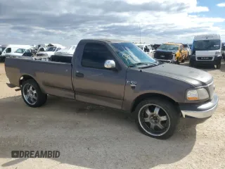 2002 Ford F-150 XL with VIN 1FTRF17W32KB68406, listed as a Copart auction lot 86059454 with 322,076 mi miles and Salvage Title. Bid and sale history available at carsss.com. Image 4.
