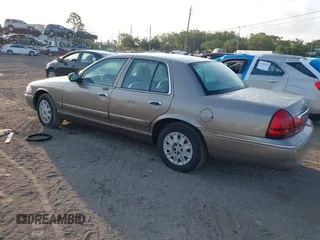 2004 Mercury Grand Marquis GS with VIN 2MEFM74WX4X696703, listed as a IAAI auction lot 42171970 with 149,556 mi miles and . Bid and sale history available at DreamBid. Image 3.