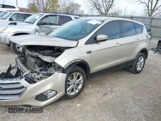 2017 Ford Escape SE with VIN 1FMCU0GD4HUC86848, listed as a IAAI auction lot 41877737 with 59,387 mi miles. Bid and sale history available at carsss.com. Image 2.