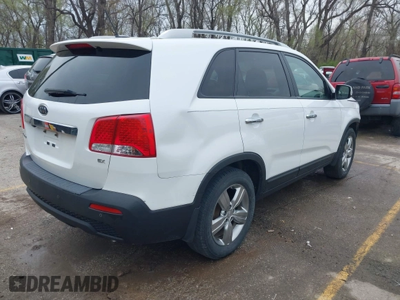 2012 Kia Sorento EX with VIN 5XYKU4A6XCG290754, listed as a IAAI auction lot 41918932 with 190,679 mi miles and . Bid and sale history available at carsss.com. Image 4.