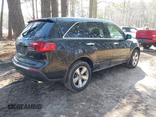 2012 Acura MDX Tech/Entertainment Pkg with VIN 2HNYD2H42CH527025, listed as a IAAI auction lot 41642926 with 140,876 mi miles. Bid and sale history available at carsss.com. Image 4.
