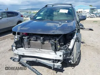 2022 Toyota RAV4 Hybrid SE with VIN JTM16RFV0ND070012, listed as a IAAI auction lot 42244604 with 22,740 mi miles and . Bid and sale history available at DreamBid. Image 6.
