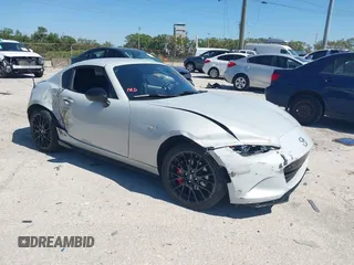2017 Mazda MX-5 Miata Club with VIN JM1NDAL70H0101561, listed as a IAAI auction lot 41773510 with 61,192 mi miles and . Bid and sale history available at DreamBid. Image 1.