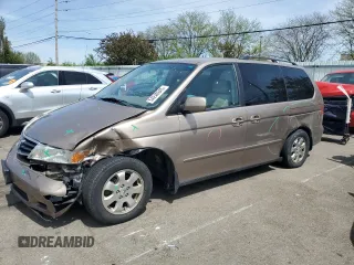 2004 Honda Odyssey EX z VIN 5FNRL18644B083467, wystawiony jako Copart lot #54240945 z przebiegiem 146 734 mil mil oraz Szkoda całkowita • Salvage title. Historia ofert i sprzedaży dostępna na DreamBid. Obrazek 1.