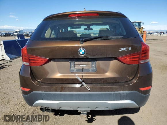 2015 BMW X1 xDrive28i z VIN WBAVL1C5XFVY35610, wystawiony jako Copart lot #54063125 z przebiegiem 115 279 mil mil oraz Szkoda całkowita • Salvage title. Historia ofert i sprzedaży dostępna na DreamBid. Obrazek 6.