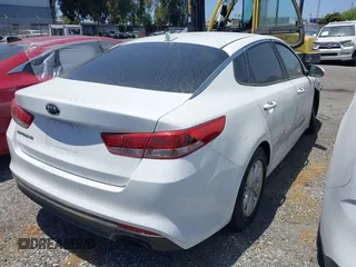 2016 Kia Optima LX z VIN KNAGT4L38G5102885, wystawiony jako IAAI lot #42229044 z przebiegiem 102 416 mil mil oraz . Historia ofert i sprzedaży dostępna na DreamBid. Obrazek 4.