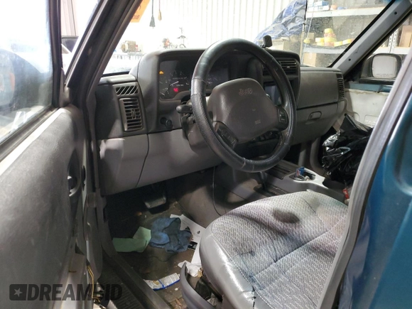 1997 Jeep Cherokee Sport with VIN 1J4FJ68S7VL509440, listed as a Copart auction lot 50895195 with 283,662 mi miles and Salvage Title. Bid and sale history available at carsss.com. Image 8.