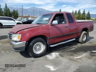 1996 Toyota T100 SR5 z VIN JT4TN14D7T0017707, wystawiony jako Copart lot #75676624 z przebiegiem 246 564 mil mil oraz Szkody całkowita. Historia ofert i sprzedaży dostępna na DreamBid. Obrazek 1.