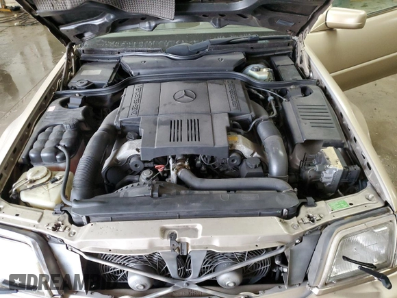 1997 Mercedes-Benz SL 500 with VIN WDBFA67F5VF147986, listed as a Copart auction lot 84255574 with 158,607 mi miles and Salvage title. Bid and sale history available at DreamBid. Image 11.