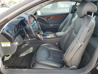 2005 Mercedes-Benz SL 500 with VIN WDBSK75F95F100318, listed as a Copart auction lot 50427245 with 80,320 mi miles and Salvage Title. Bid and sale history available at DreamBid. Image 7.