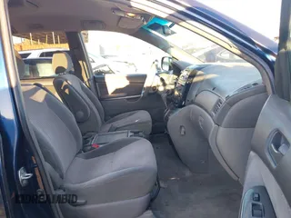 2005 Toyota Sienna CE with VIN 5TDZA23C25S321595, listed as a IAAI auction lot 41666085 with 199,810 mi miles. Bid and sale history available at carsss.com. Image 5.