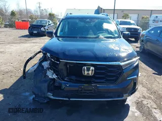 2023 Honda Pilot Elite with VIN 5FNYG1H80PB017732, listed as a IAAI auction lot 41643842 with 26,420 mi miles. Bid and sale history available at carsss.com. Image 12.