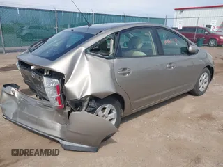 2007 Toyota Prius z VIN JTDKB20U073280948, wystawiony jako IAAI lot #42166258 z przebiegiem 236 628 mil mil oraz . Historia ofert i sprzedaży dostępna na DreamBid. Obrazek 4.