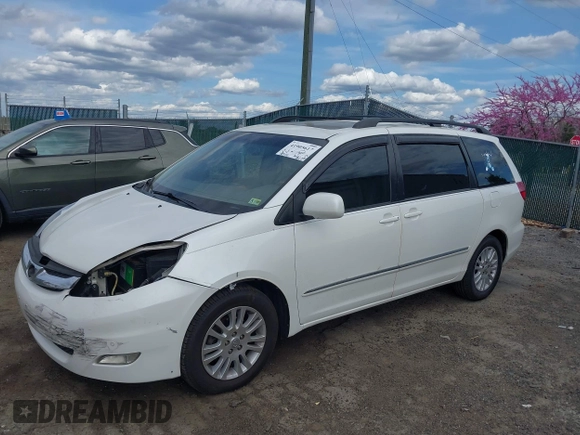 2009 Toyota Sienna XLE with VIN 5TDZK22C79S259793, listed as a IAAI auction lot 41905617 with 185,121 mi miles and . Bid and sale history available at DreamBid. Image 2.