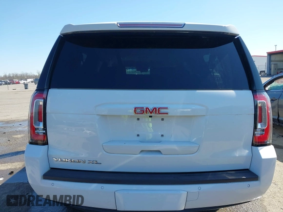 2019 GMC Yukon XL SLT with VIN 1GKS1GKC0KR330715, listed as a IAAI auction lot 41758626 with 134,641 mi miles. Bid and sale history available at carsss.com. Image 16.