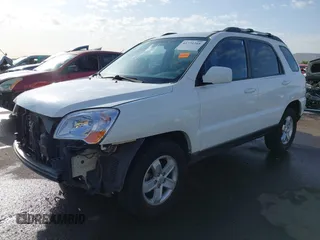 2009 Kia Sportage LX with VIN KNDJF723197622517, listed as a IAAI auction lot 41771268 with 127,112 mi miles. Bid and sale history available at carsss.com. Image 18.