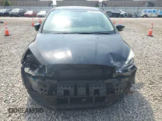 2016 Ford Focus SE with VIN 1FADP3F22GL233402, listed as a Copart auction lot 60854175 with 77,002 mi miles and Salvage title. Bid and sale history available at DreamBid. Image 5.